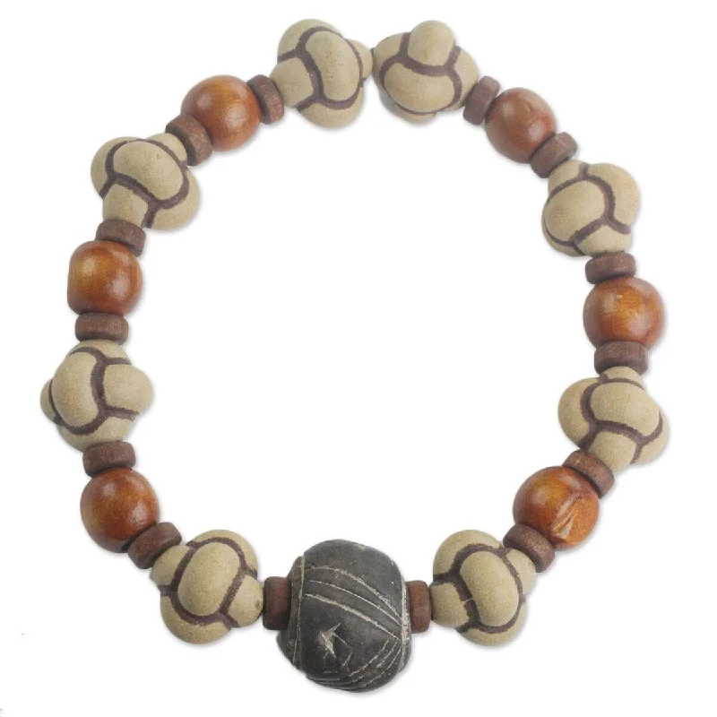 classic pearl bracelet -NOVICA Bold Adventurer, Men's terracotta and wood beaded stretch bracelet