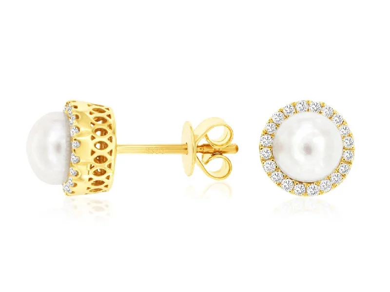 Ear jackets for trendy looks -14K Yellow Gold Pearl and Diamond Stud Earring