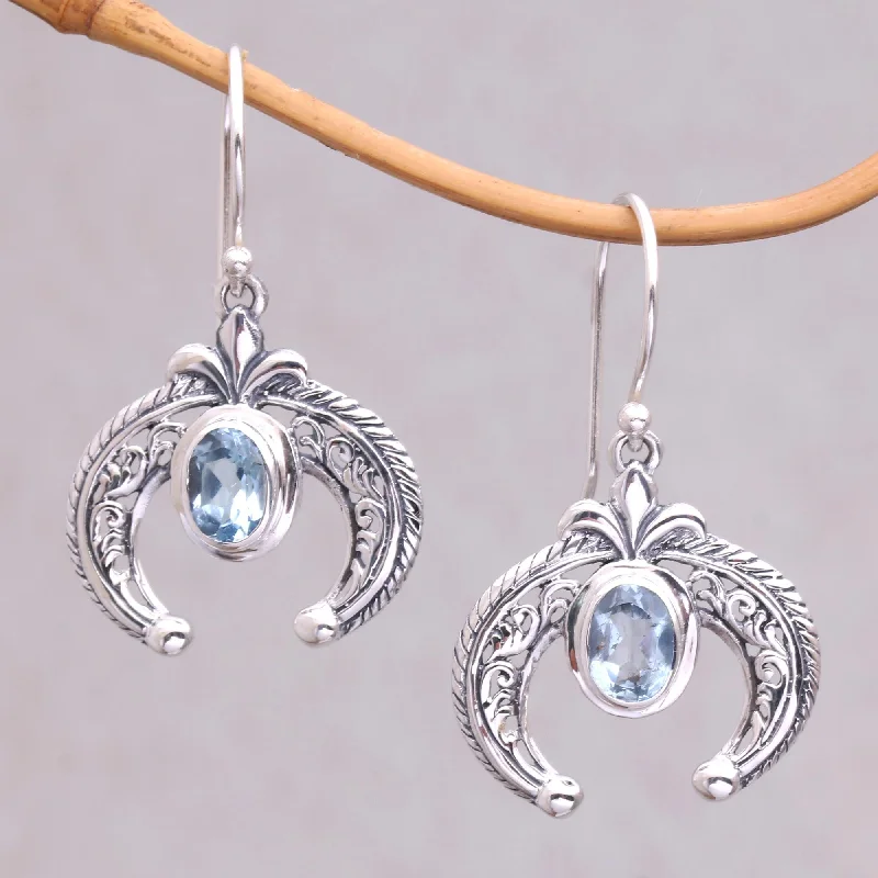 Cute heart-shaped earrings for women -Elegant Talons Indonesian Blue Topaz and Sterling Silver Dangle Earrings