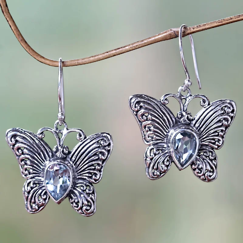 Custom designed earrings for personal touch -Enchanted Butterfly Handcrafted Indonesian Silver and Blue Topaz Earrings