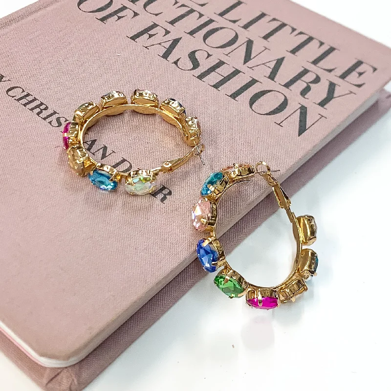 Unique asymmetric earrings for fashion-forward looks -Pink Panache | Gold Tone Hoop Earrings with Multicolored Oval Crystals